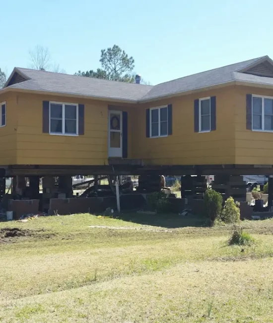 stilt house with gable roos Elite Structural Movers, Inc.