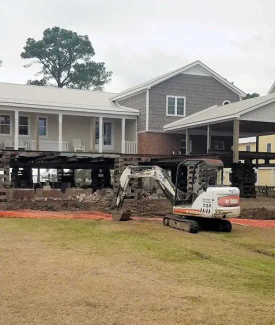 stilt house with valcony Elite Structural Movers, Inc.